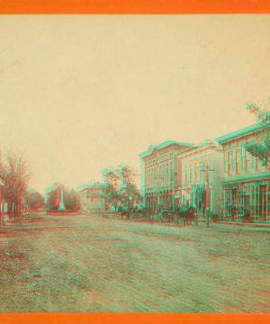 [Main street, with shops and horse carriages, Girard, Pennsylvania. 1870?-1880?