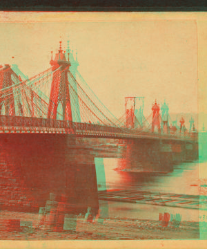 The beautiful Suspension Bridge across the Allegheny, at St. Clair St. Pittsburgh. 1860?-1870?