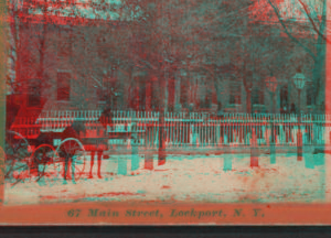 [Horse and carriage on snowy street in front of large building, Lockport, N.Y.] [1870?-1900?]