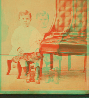 [Little boy sitting in a chair.] 1868?-1885?