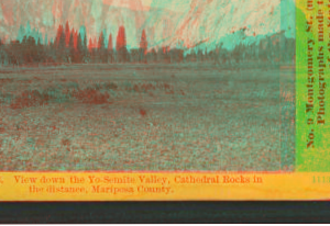 View down the Yo-Semite Valley, Cathedral Rocks in the distance, Mariposa County. 1864?-1874?