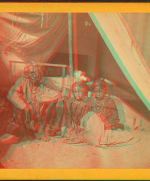 [Man and two girls outside entrance to a tent.] 1865?-1915? 1865-1915