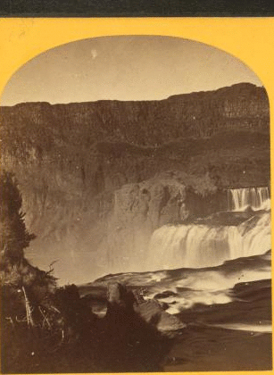 Shoshone Falls, Snake River, Idaho. Main fall, 210 feet from upper to lower level; height of caÒon walls at the falls, 1,000 feet. A number of minor falls, islands, and boulder rocks among the main falls add beauty to the lonely majesty of this scene. 1874