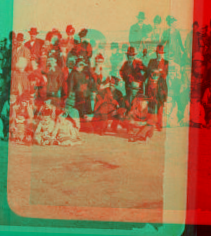 [Group portrait of people posing against a background of the beach.] 1869?-1880?