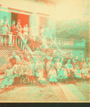 [Portrait of children in front of a school(?).] 1865?-1880?