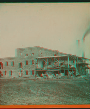 [Men lifting hay into a 2-story shed, Stockton, California.] 1869?-1879? ca. 1880