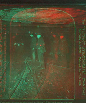 Group of miners in the main tunnel (1 1/2 miles long) of a huge coal mine, Pittsburg, Pa., U.S.A. 1868?-1915?