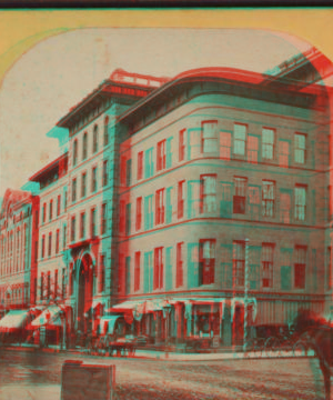 [A business block with stores and offices.] 1875?-1885?