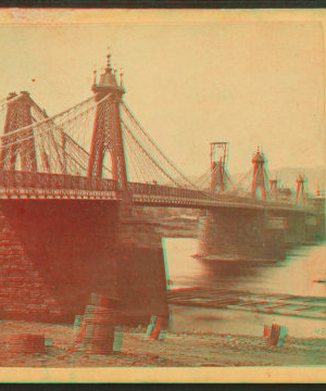 The beautiful Suspension Bridge across the Allegheny, at St. Clair St. Pittsburgh. 1860?-1870?