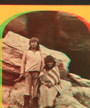 Navajo brave and his mother. 1873