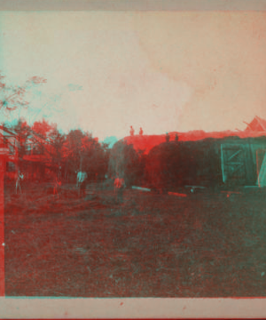 [View of farmers rebuilding a haystack.] 1878