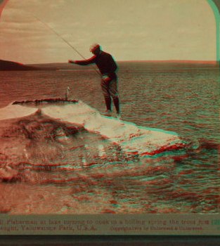 Fisherman at lake turning to cook in a boiling spring the trout just caught, Yellowstone Park, U.S.A. 1901, 1903, 1904