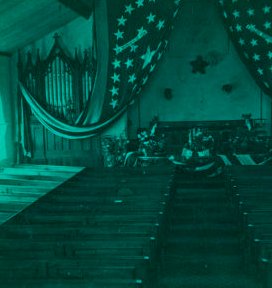 [Church (?) interior, draped with flags.] 1865?-1890?