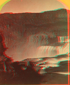 Shoshone Falls, Snake River, Idaho. Main fall, 210 feet from upper to lower level; height of caÒon walls at the falls, 1,000 feet. A number of minor falls, islands, and boulder rocks among the main falls add beauty to the lonely majesty of this scene. 1874