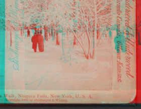 A lover's walk, Niagara Falls, New York, U.S.A. [View of couple walking in winter scene.] 1860?-1905