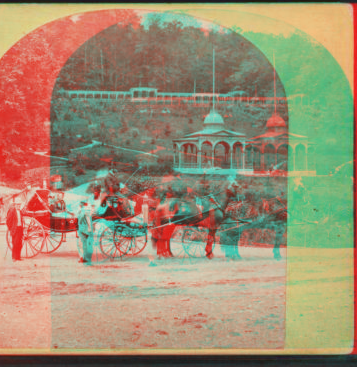 Sharon Springs, N.Y. [View of women on horse-drawn carts. Magnesia Temple in background.] [ca. 1865] [1864?-1875?]