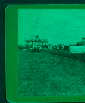 [Albert Tirrell's house in South Weymouth, showing house and greenhouse.] 1859?-1885?