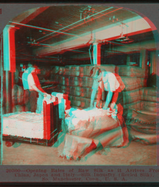 Opening bales of raw silk as it arrives from China, Japan and Italy. Silk industry (reeled silk), South Manchester, Conn., U.S.A. c1914 1914