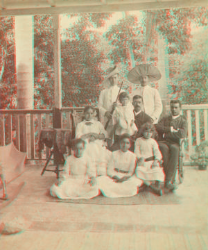 [Family portrait on porch.] [ca. 1880]