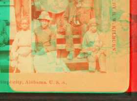 Simplicity, Alabama, U.S.A. [Group gathered on a porch, in town.] 1868?-1900?