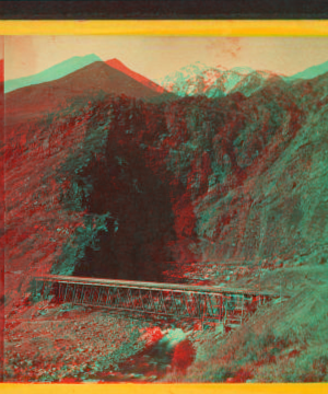 Devil's Gate from the south, the high peaks of the Wahsatch [Wasatch] in the distance. Union Pacific Railroad. 1865?-1885?