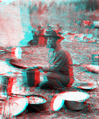 Views among the Rocky Mountains of Colorado. Camp scene. Flipping flapjacks, "Potato John." Colorado. 1874.