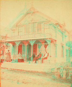 [People on the porch of a cottage.] 1865?-1880?