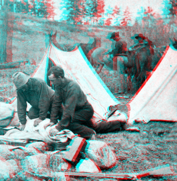 Views among the Rocky Mountains of Colorado. Camp scene. Holmes and Chittenden rolling up bedding. Colorado. 1874.