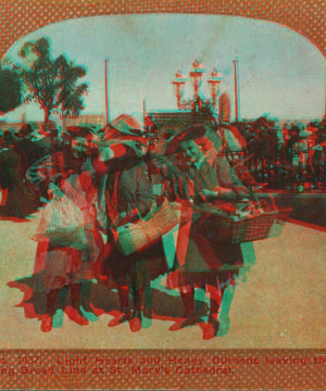 Light hearts and heavy burdens leaving the long bread line at St. Mary's Cathedral. 1906