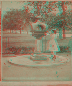 Drinking fountain, Central Park, N.Y. [Girl in a dress at the fountain.] 1860?-1905?