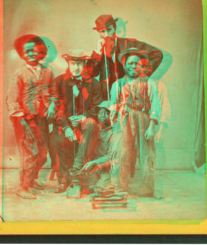 Shoe Blacks. [Studio portrait of three young shoe shiners and their customers.] 1868?-1900?