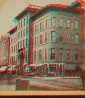 [A business block with stores and offices.] 1875?-1885?