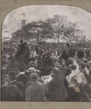 Castle Garden, now the aquarium, with a very interesting foreground [large crowd of people, some waving at a procession, in foreground]. 1865?-1910?