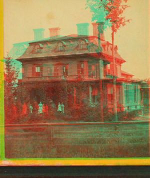 [Johnson house showing the family on the porch of the wood frame home.] 1859?-1880?