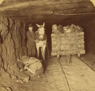 Mining coal three miles under ground, Pennsylvania, U.S.A. 1860?-1900? c1895