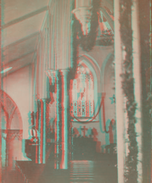 [View of a garland-draped church interior with the pastor in the pulpit.] 1869?-1890? ca. 1875