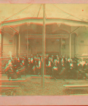 Group of men posing at the preacher's stand. 1863?-1885?