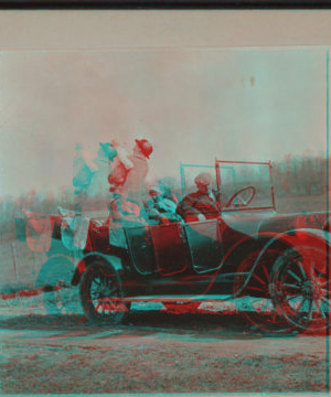 [Family in touring car.] 1915-1919 April 1916