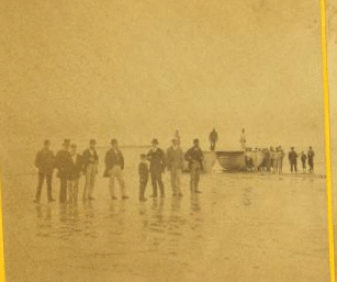 Landing of the French Atlantic telegraph cable on Duxbury Beach, with the officers of the steamers and barges that landed the cable on shore, in the foreground. 1860?-1880?