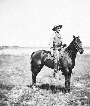 Yellowstone National Park, Wyoming. Camp scene. Steve Hovey, "wagon boss." U.S. Geological and Geographical Survey of the Territories (Hayden Survey).