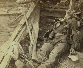 Dead Confederate soldier as he lay on the field, after the battle of the 19th May, near Mrs. Allsop's, Pine Forest, 3 miles from Spottsylvania Court House, Va.