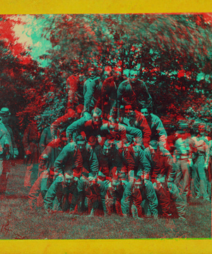 Gymnastic field sports of the gallant 7th. A four story pile of men. [Stereograph]