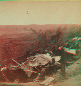 Line of breastworks occupied by Union troops on north bank of North Anna, enemies' line of works on south bank, in the distance.