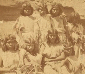 Kai-vav-its, a tribe of Pai Utes living on the Kai-bab Plateau near the Grand CaÒon of the Colorado in Northern Arizona : group of women in full dress. 1874 1871-1874