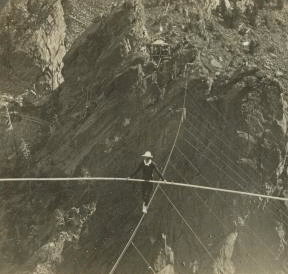 Ivy Baldwin breaking the record for tight-rope walking-rope 580 feet high and 555 feet long, near Boulder, Colo. c1907 1865?-1907