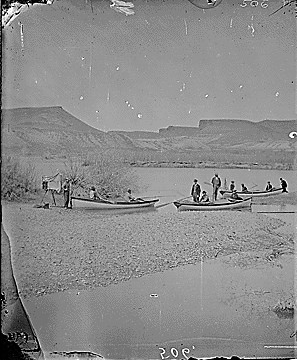 Green River. Just below U.P. Railroad bridge at Green River, Wyoming. Left bank with boats of Powell's 2nd Expedition, BEFORE THE START