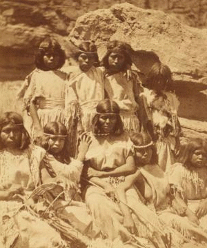 Kai-vav-its, a tribe of Pai Utes living on the Kai-bab Plateau near the Grand CaÒon of the Colorado in Northern Arizona : group of women in full dress. 1871-1874