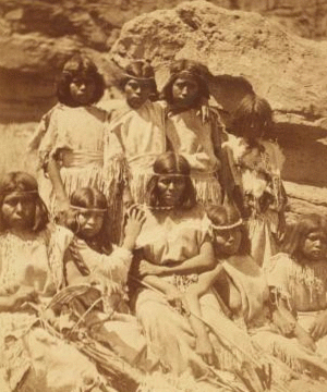 Kai-vav-its, a tribe of Pai Utes living on the Kai-bab Plateau near the Grand CaÒon of the Colorado in Northern Arizona : group of women in full dress. 1871-1874