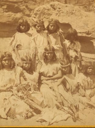 Kai-vav-its, a tribe of Pai Utes living on the Kai-bab Plateau near the Grand CaÒon of the Colorado in Northern Arizona : group of women in full dress. 1874 1871-1874