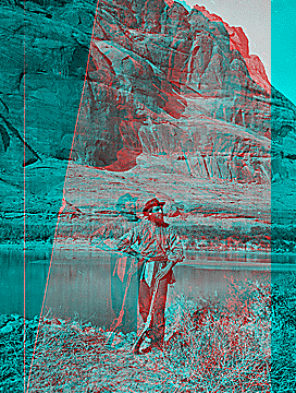 Glen Canyon. John F. Steward with his gun, pick and shoulder bag (map case?) and wearing the usual wide brim felt hat. Old nos. 307, 404, 414, 609.